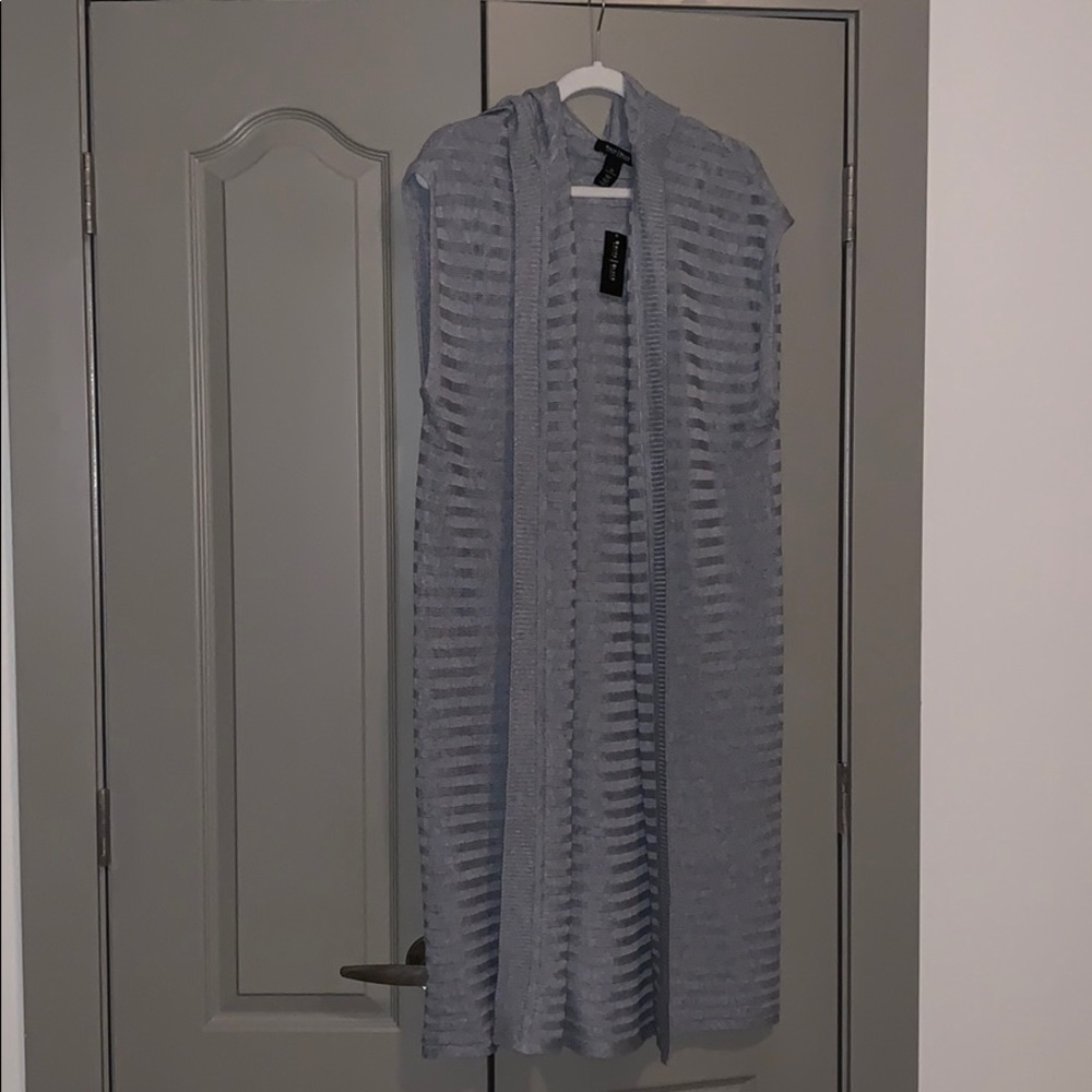 White House black market sleeveless cardigan.